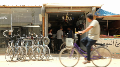 Bicycle shop in Zaatari refugee camp, Jordan, from the film Shelter Without Shelter by Mark E Breeze and Tom Scott-Smith.