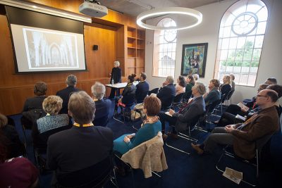 Fellow in English Jeri Johnson discusses James Joyce in the Kloppenburg Room during the formal opening of Cohen Quad