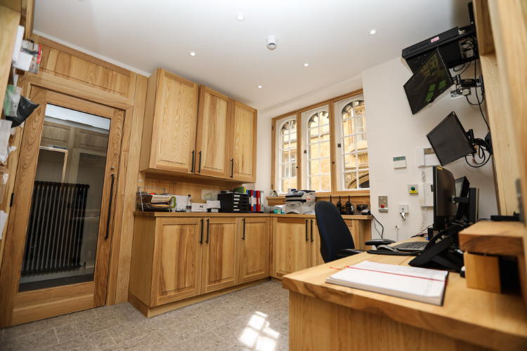 The refurbished Porters' Lodge main front desk, storage and electronic systems