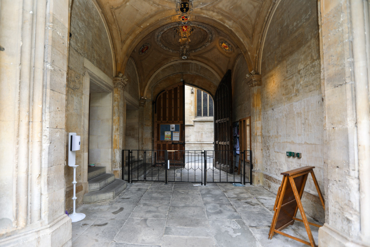 The secondary gates of the new Porters' Lodge facing towards Turl Street with the wooden gate half open
