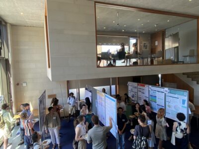 Attendees discuss research posters during a busy poster session at Cohen Quad as part of Oxford Sleep Science and Medicine Day 2026